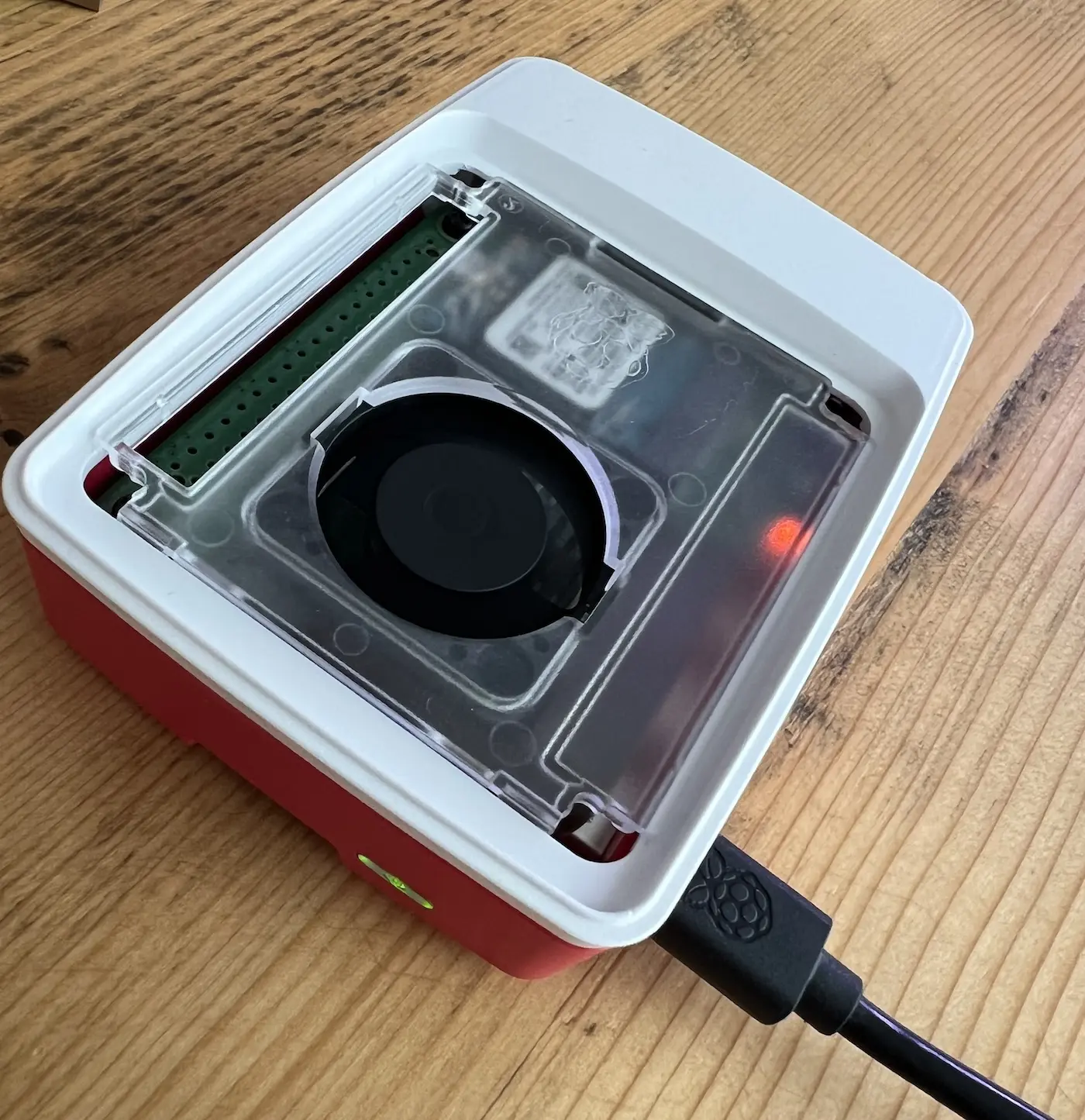 raspberry enclosed in a case with a fan