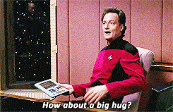 character Q from Star Trek TNG saying "How about a big hug?"